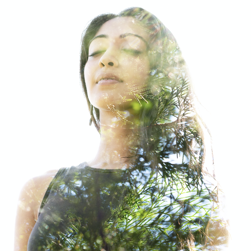 peaceful woman double exposure with nature